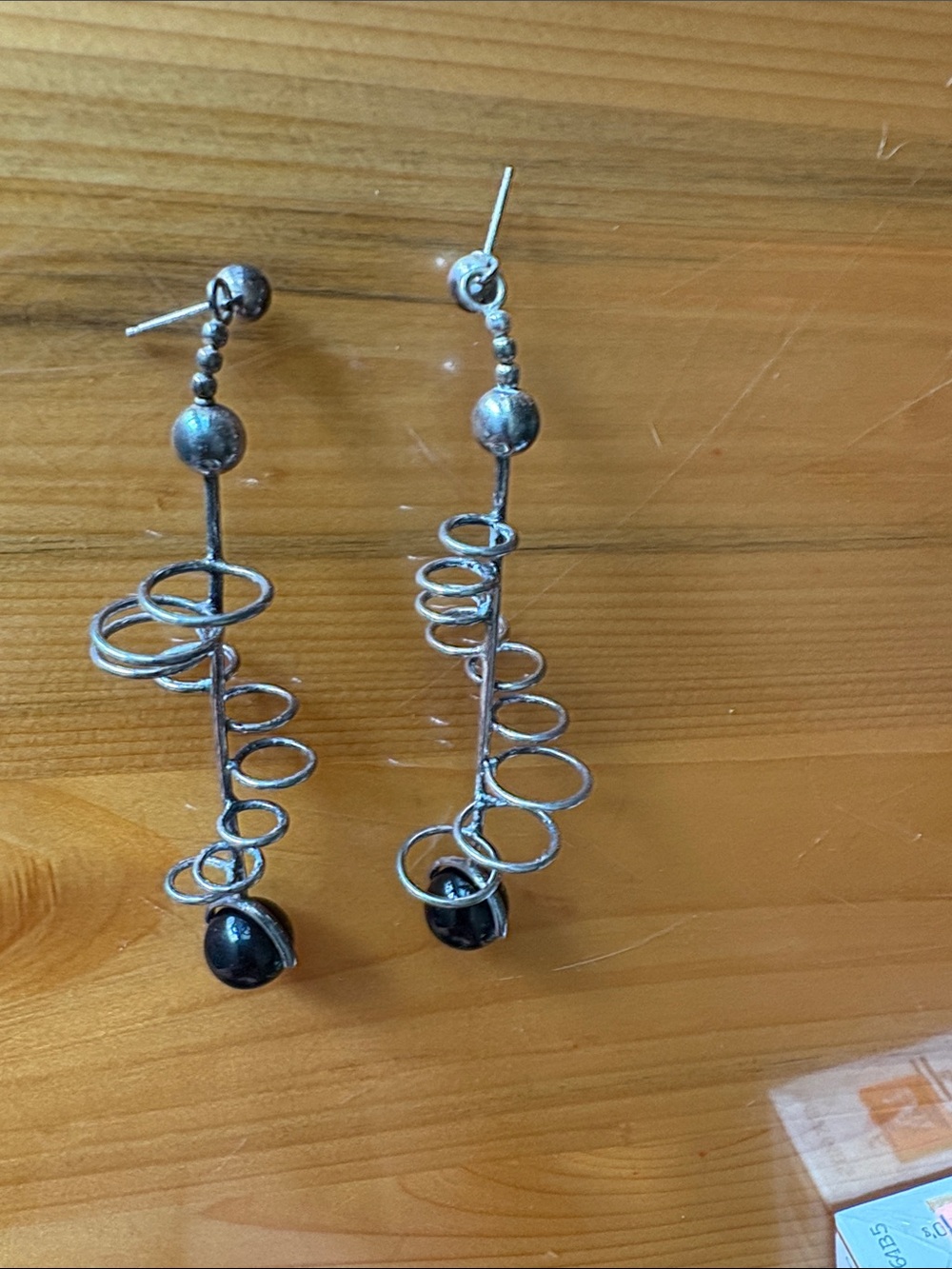 Silver-Tone Spiral Drop Earrings with Black Bead Accent - Picture 3 of 4